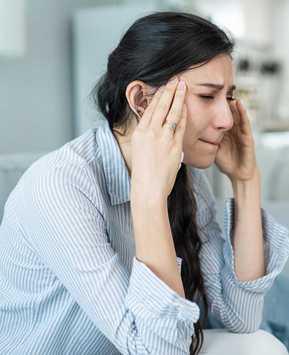 Woman experiencing migraine - Draper, UT Chiropractor for Migraines Woman experiencing migraine - Draper, UT Chiropractor for Migraines